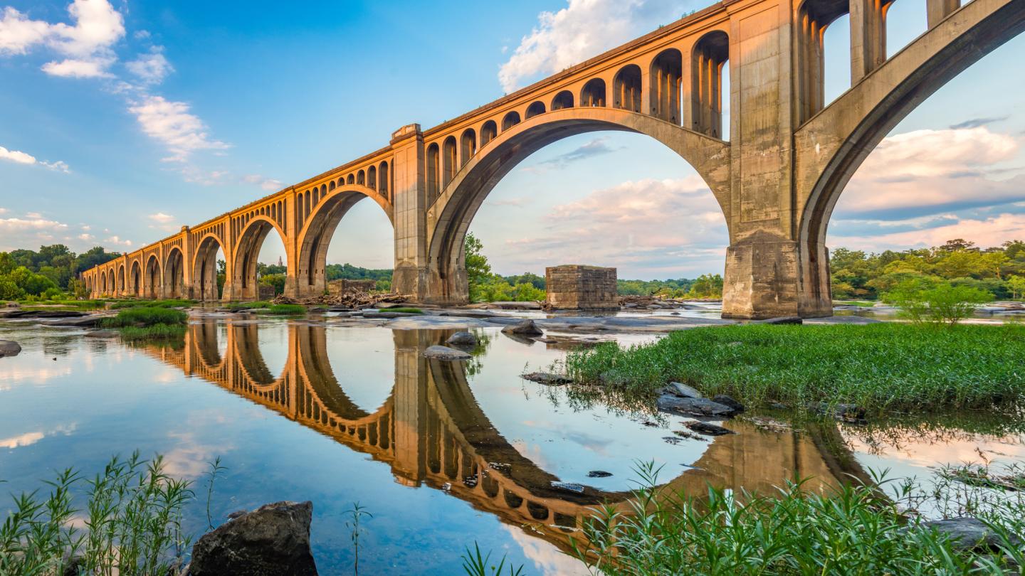 bridge over the james river with reflection